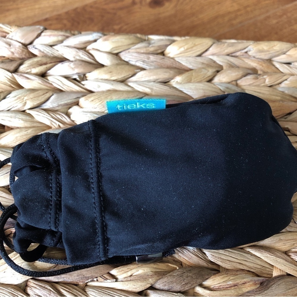 Tieks travel shoe case and reusable shopping bag.